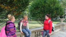 Students standing on the porch of Guerin